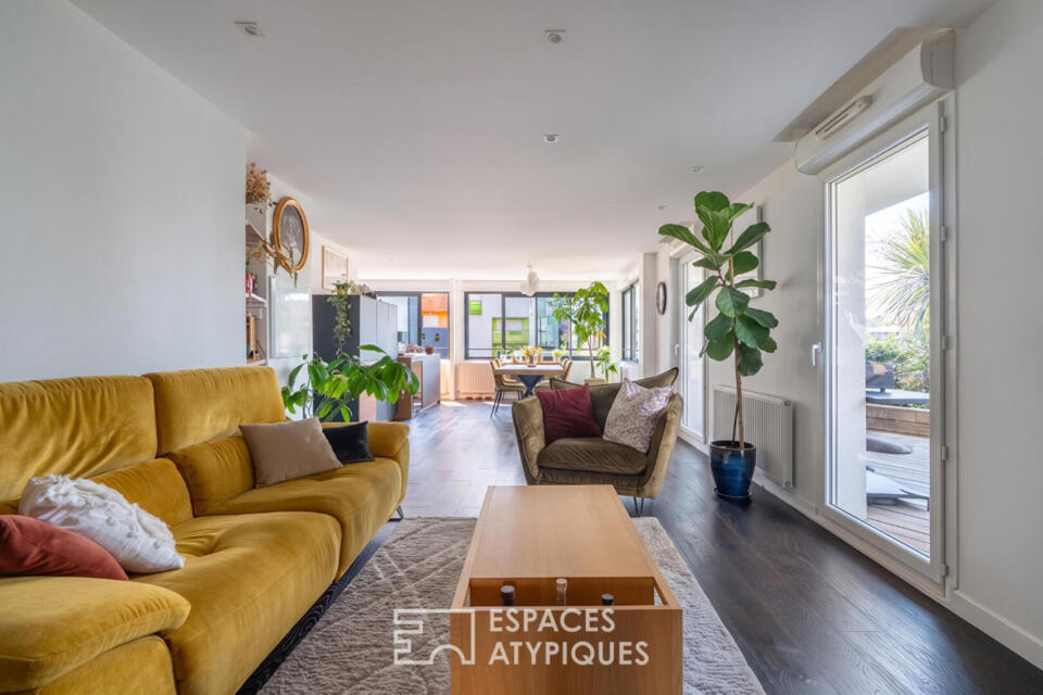 Appartement T3 de 84 m² avec terrasse de 60 m² paysagée, box et place parking