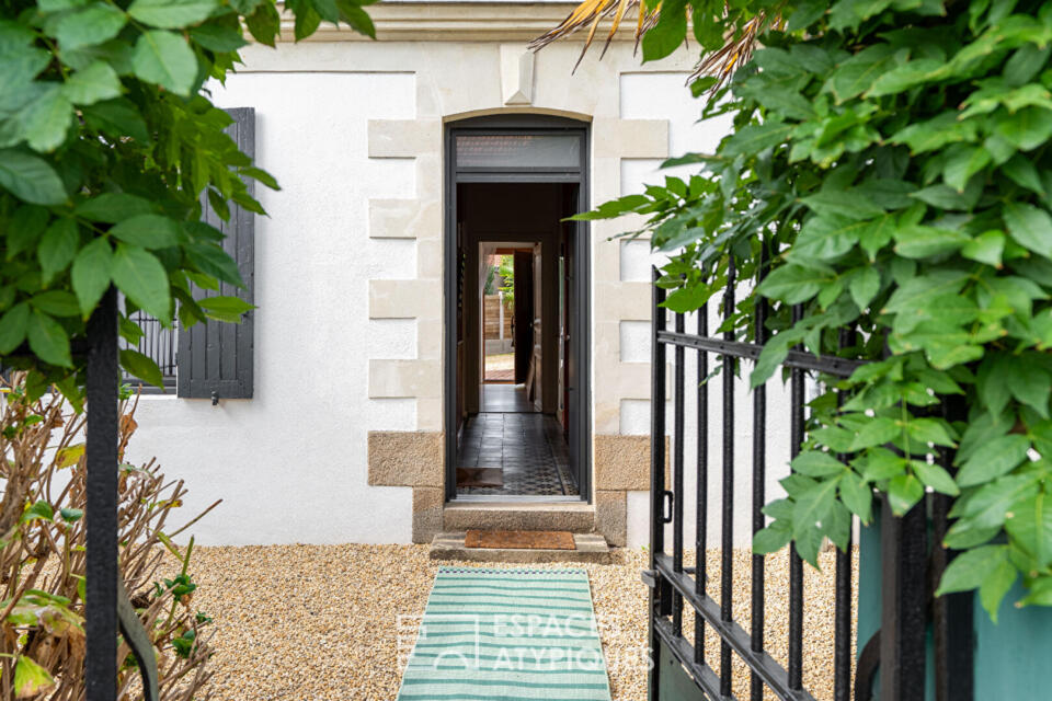 Une maison de charme en parfaite harmonie avec son jardin arboré