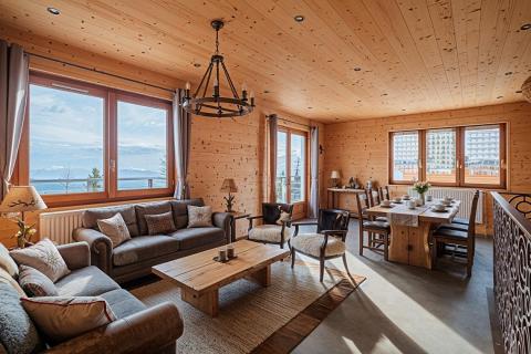 Chalet skis aux pieds avec vue sur la Croix de Chamrousse