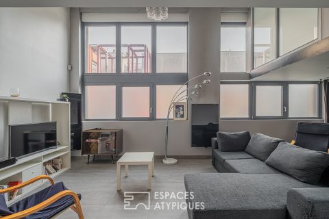 Appartement loft en duplex et petite terrasse coté cour 77 m2