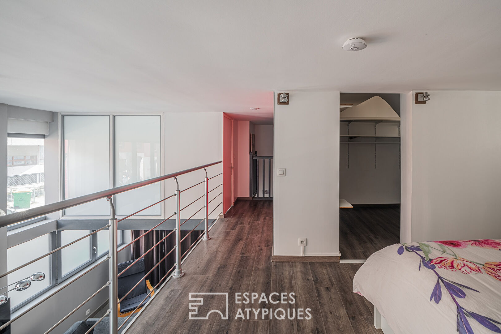 Appartement loft en duplex et petite terrasse coté cour 77 m2