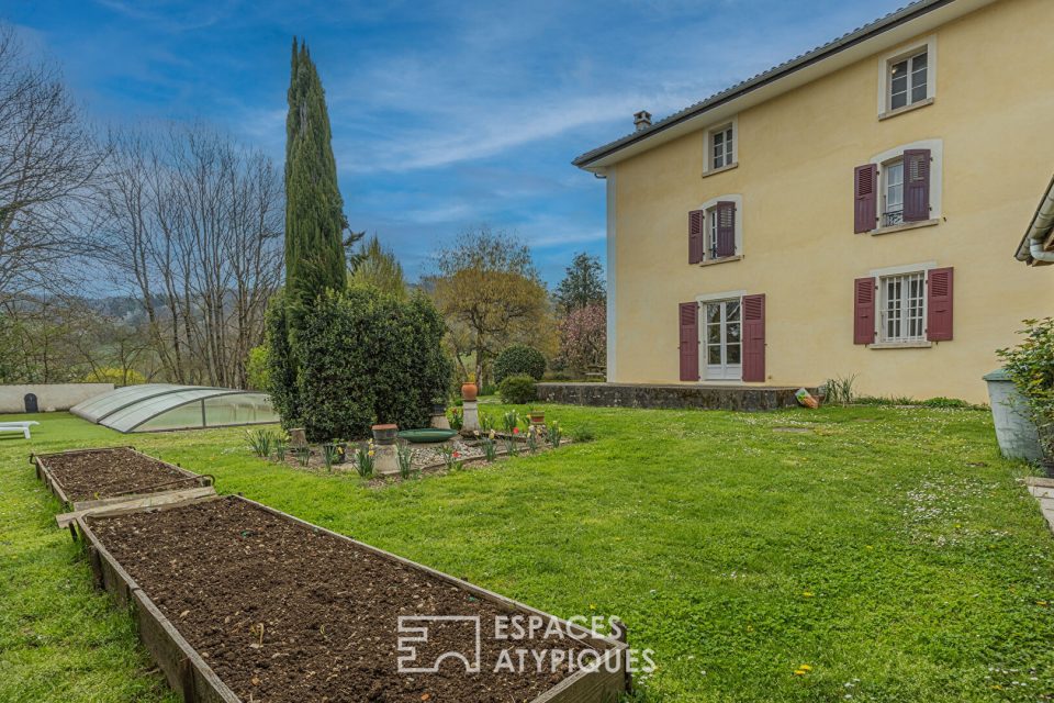 Maison de caractère et son bel environnement verdoyant