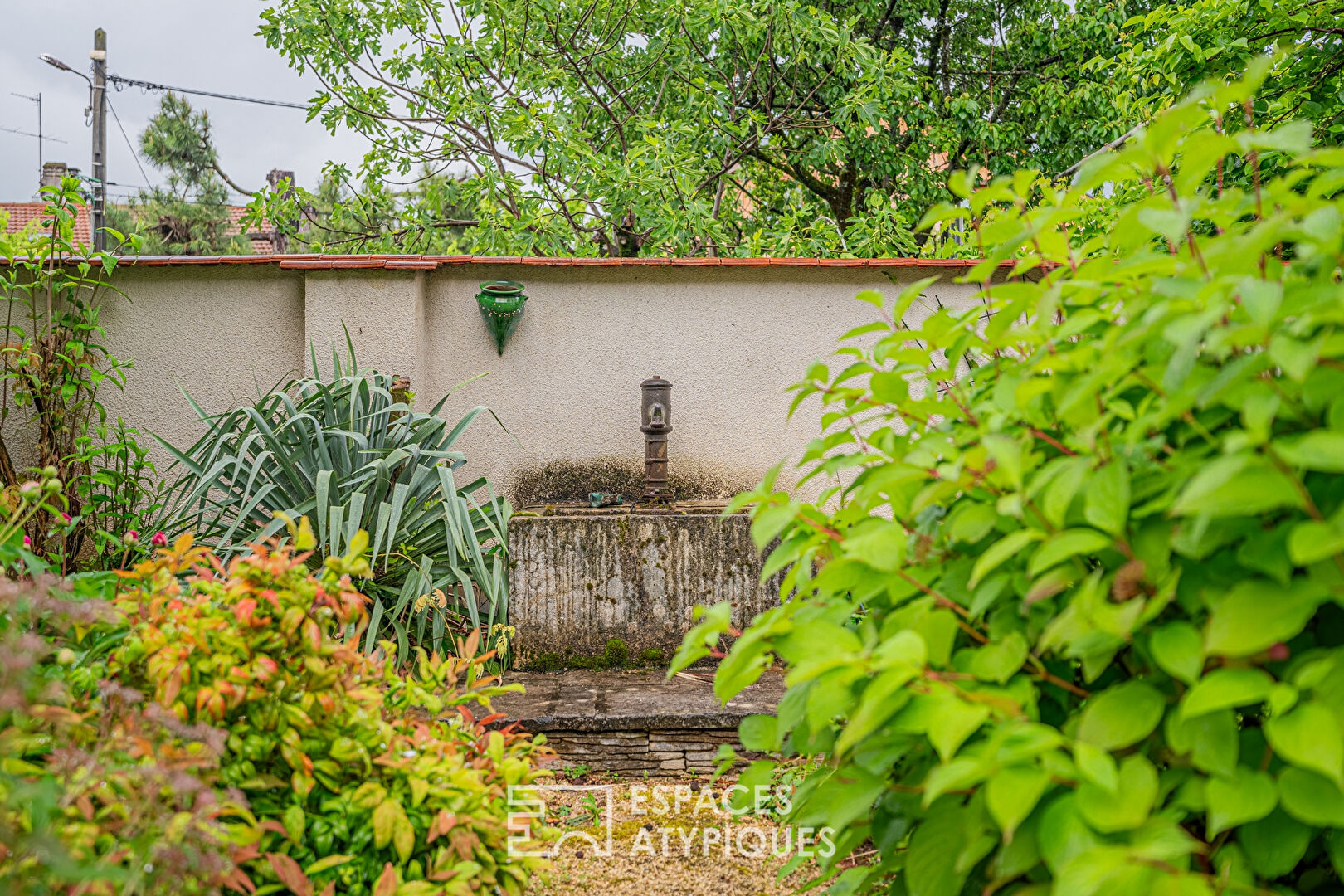 Maison bourgeoise et son jardin en centre-ville