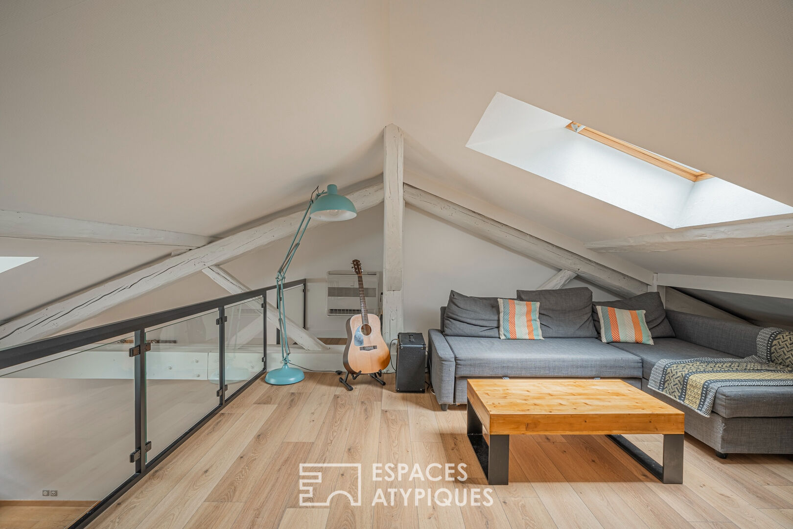 Appartement de caractère sous les toits en centre-bourg