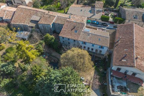 Immeuble de rapport au coeur d&rsquo;anciennes écuries réhabilitées