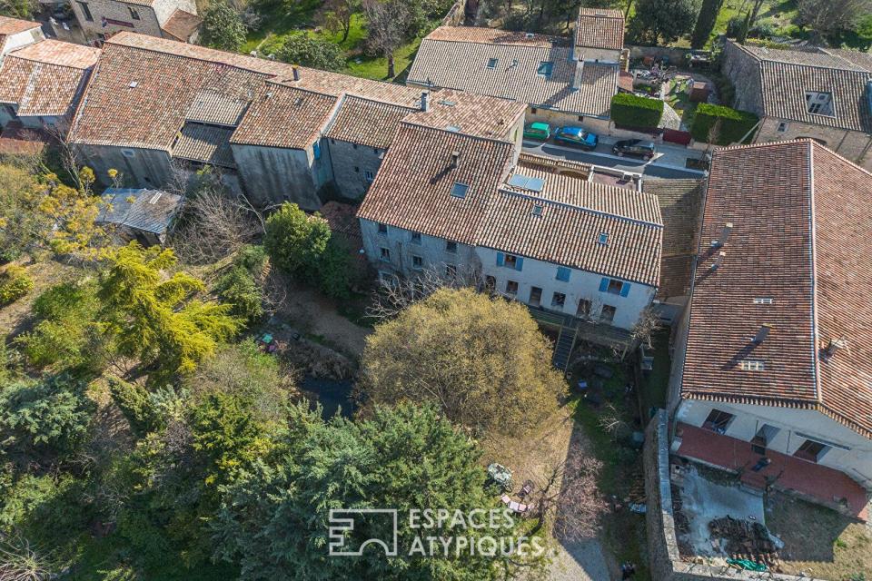 Immeuble de rapport au coeur d'anciennes écuries réhabilitées