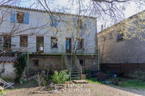 Immeuble de rapport au coeur d&rsquo;anciennes écuries réhabilitées