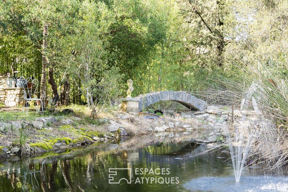 Maison bois avec jardin et étang