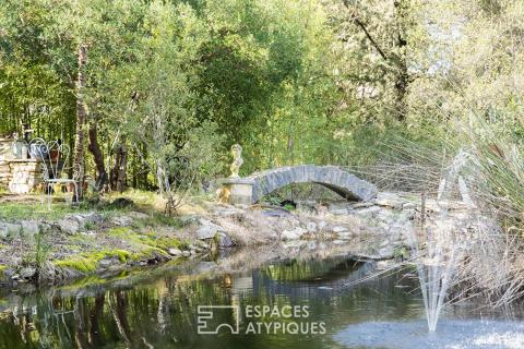 Maison bois confidentielle avec étang au coeur de la garrigue