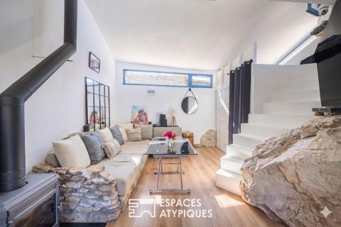 La maison qui habite le rocher