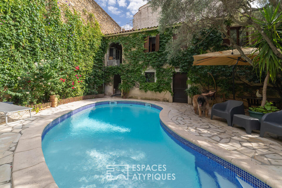 Propriété de caractère avec piscine, 4 chambres et revenus locatifs