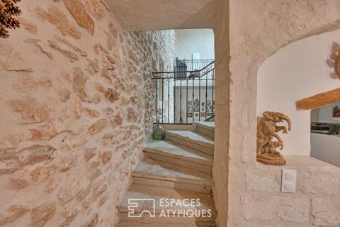 Old stable revisited into a village house with patio