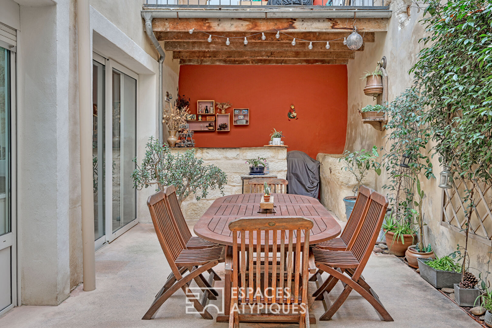 Old stable revisited into a village house with patio