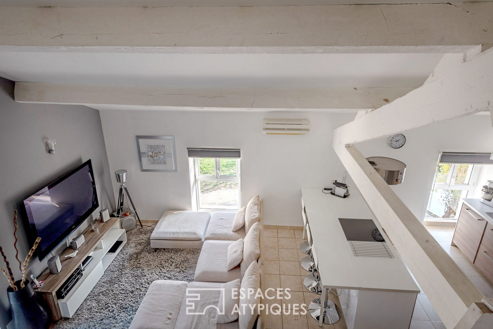 Duplex dernier étage style loft