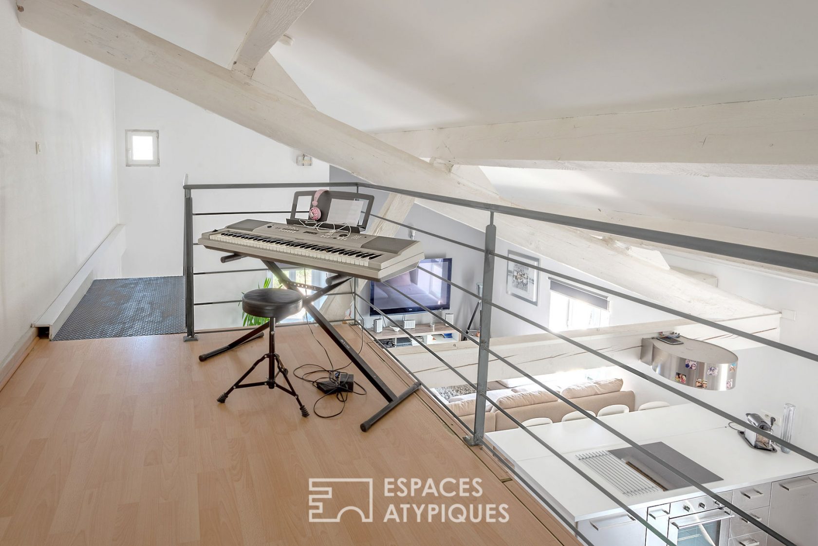 Duplex dernier étage style loft