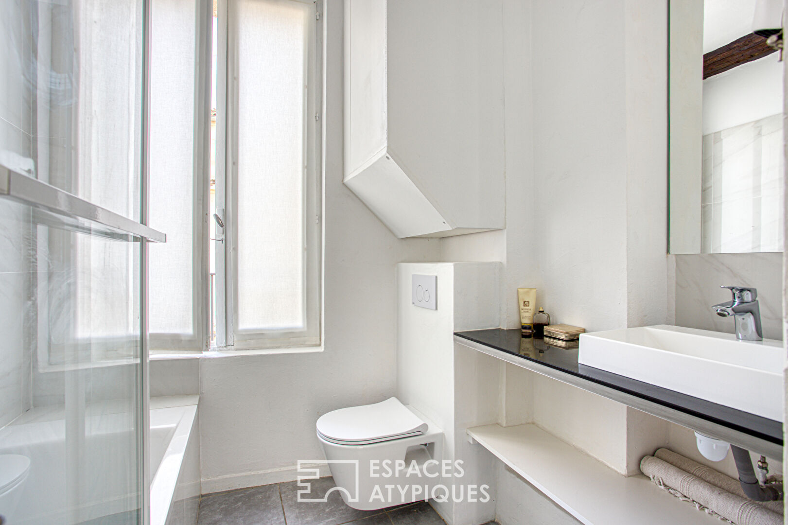 Rénovation raffinée pour ce beau duplex en dernier étage