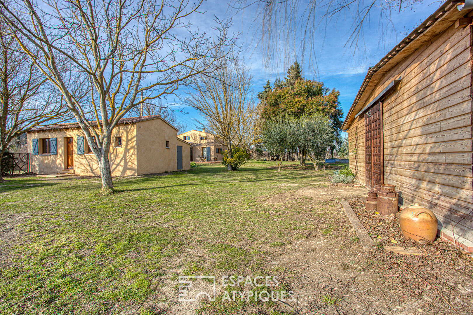 House and outbuildings in the heart of green nature