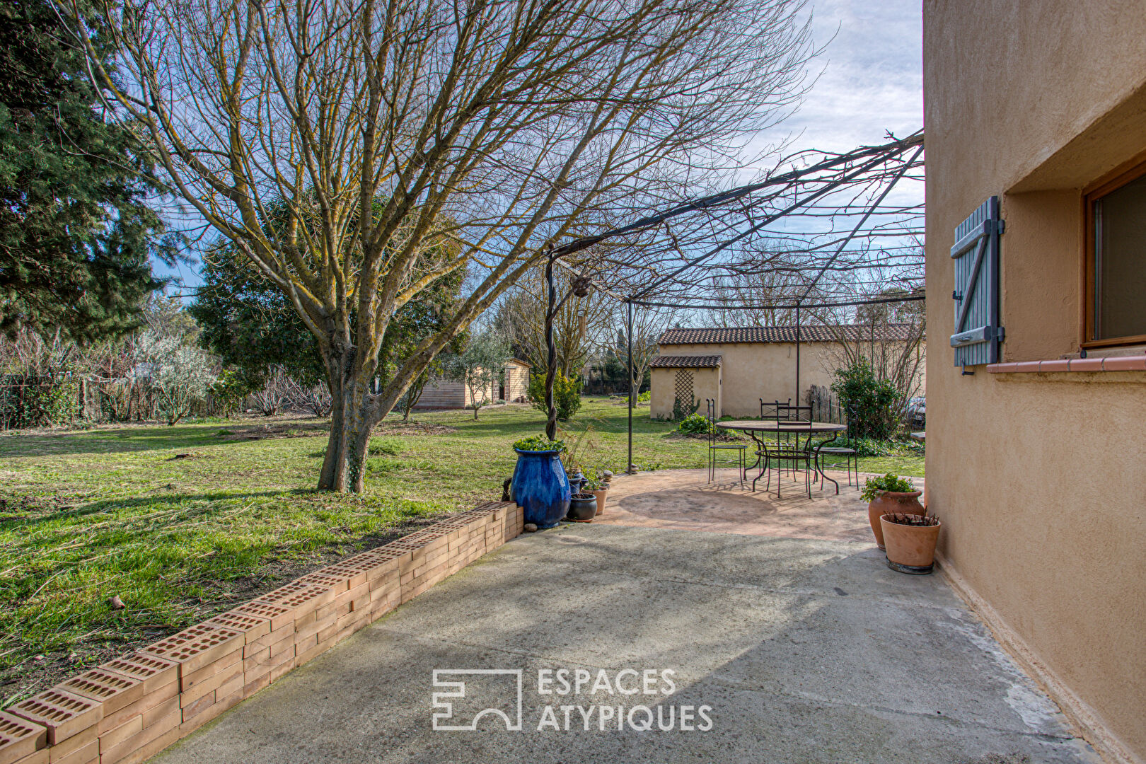 House and outbuildings in the heart of green nature