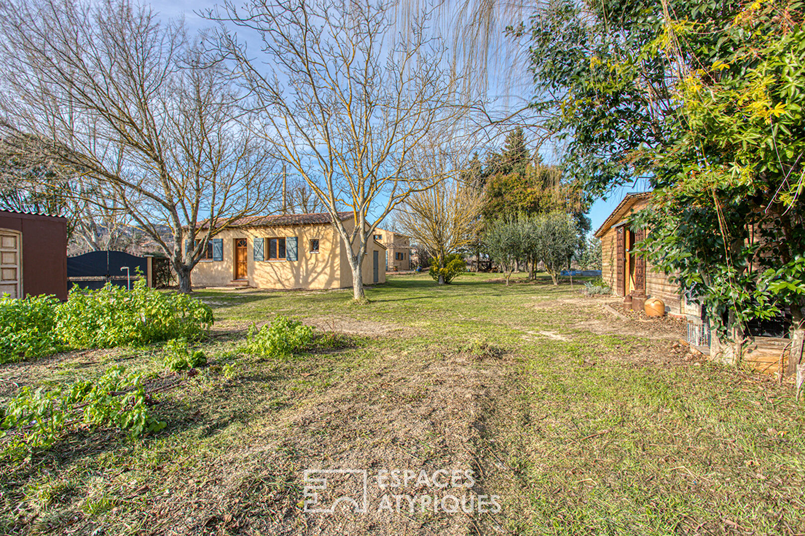 House and outbuildings in the heart of green nature