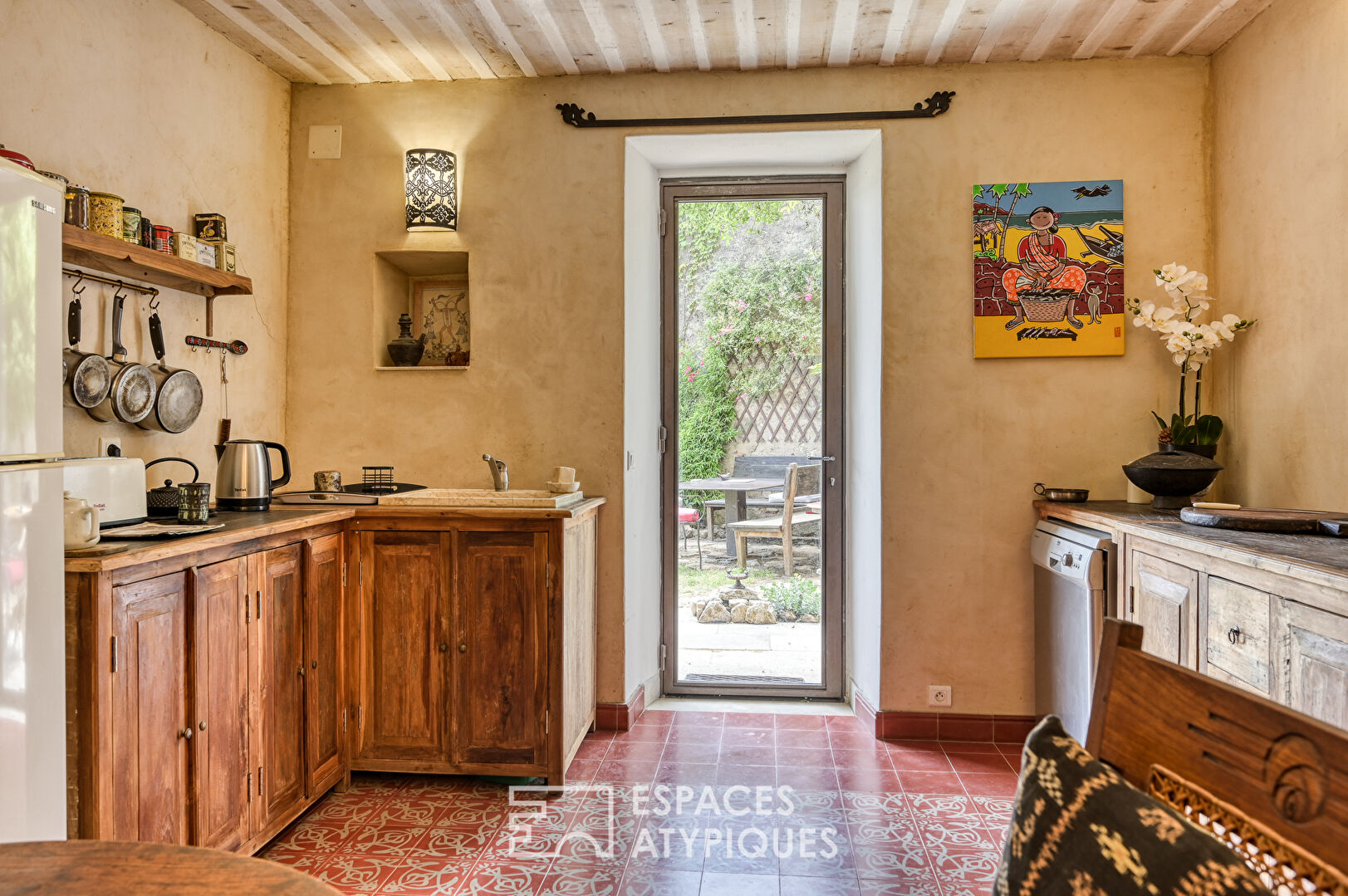 Elegant hamlet house and its landscaped garden