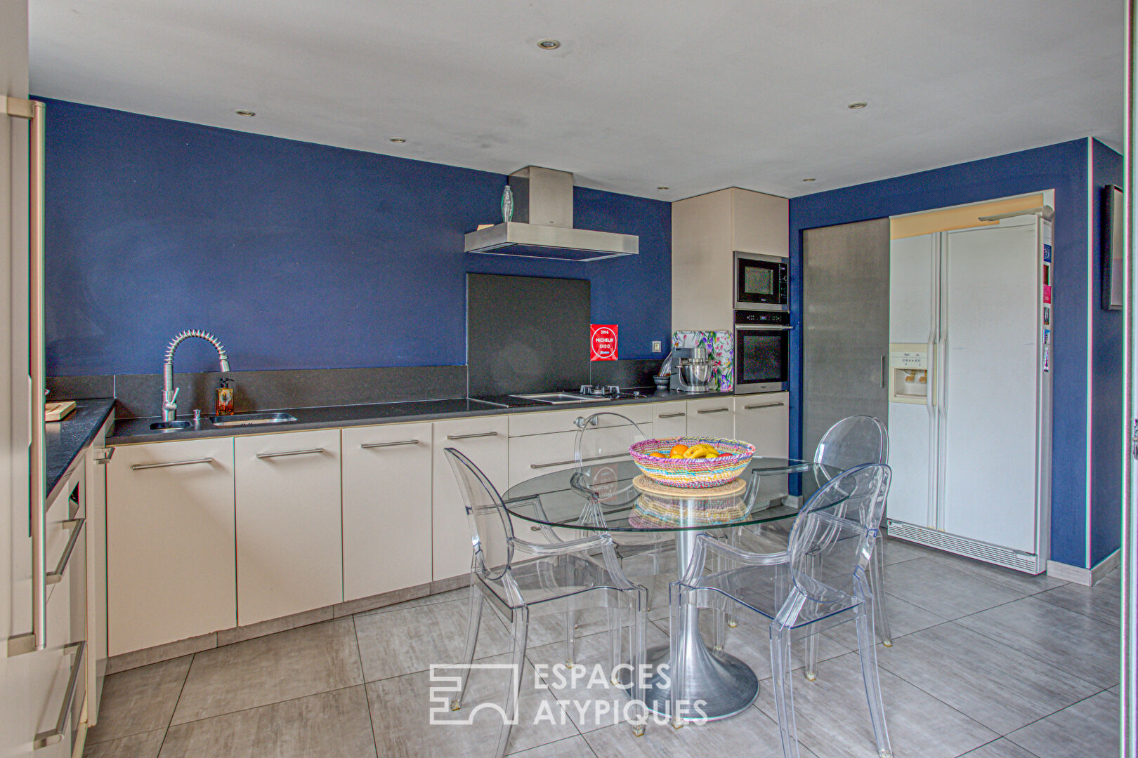 Spacieux duplex type loft avec terrasses et garage