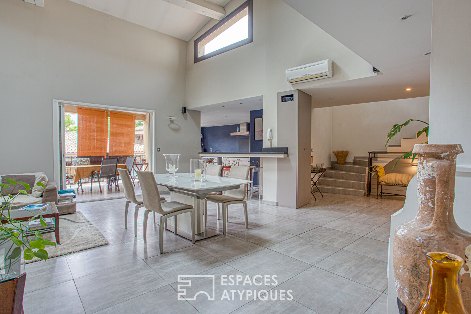 Spacieux duplex type loft avec terrasses et garage