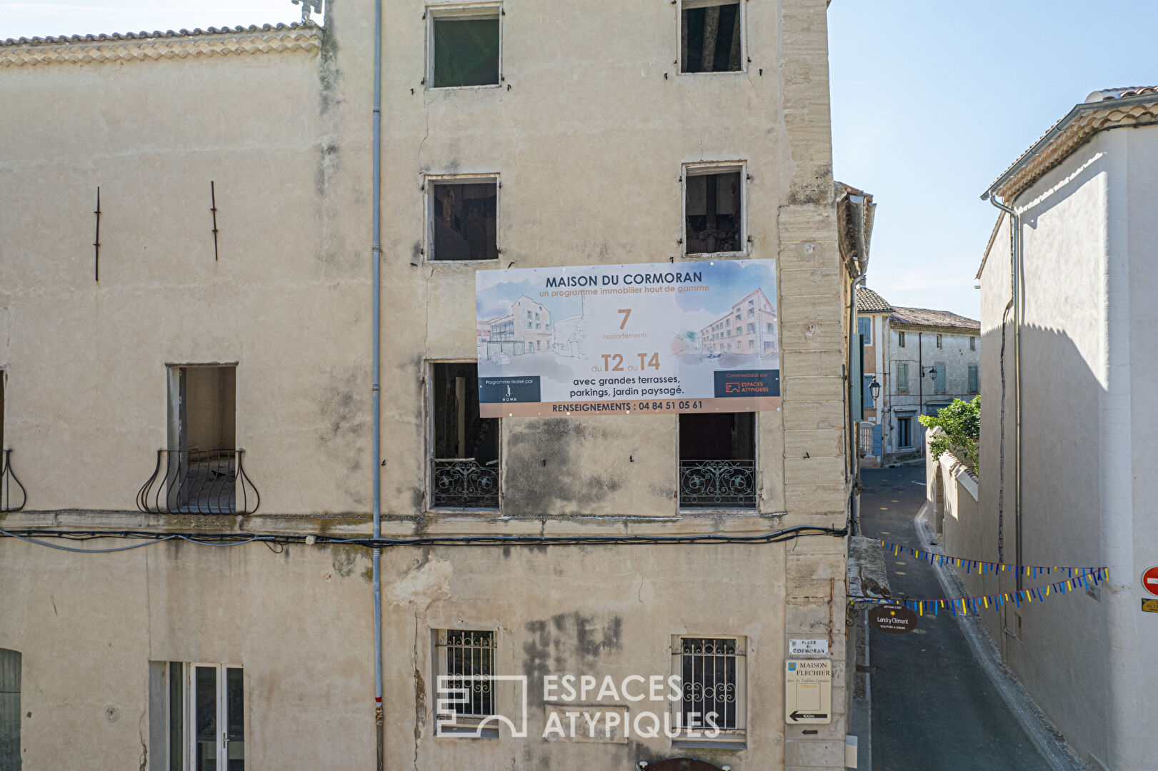 Charme et volumes pour ce T3  avec balcon en coeur de village