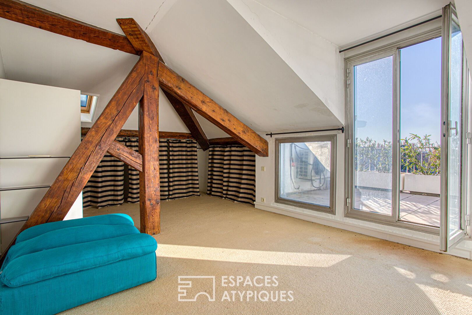 Appartement d’exception à rénover avec son rooftop dans un quartier prisé