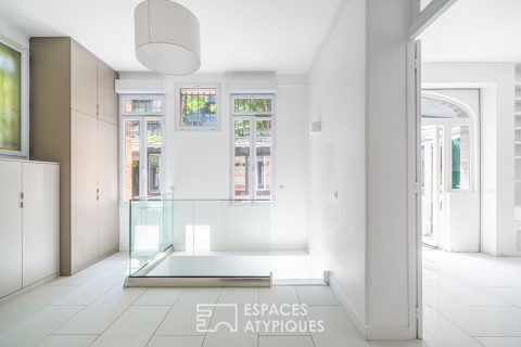 Loft avec véranda et terrasses, rue de la Colonie