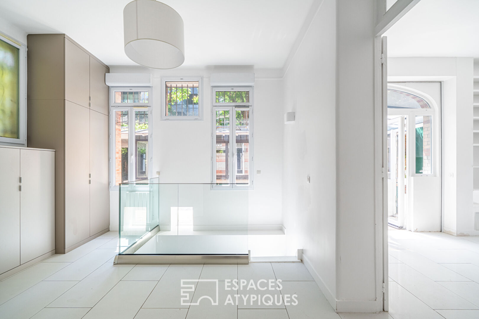 Loft avec véranda et terrasses, rue de la Colonie