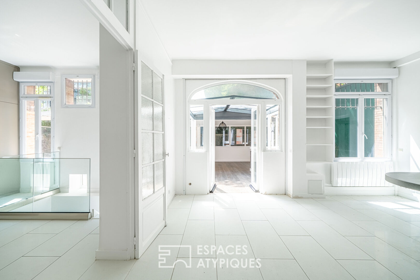 Loft avec véranda et terrasses, rue de la Colonie