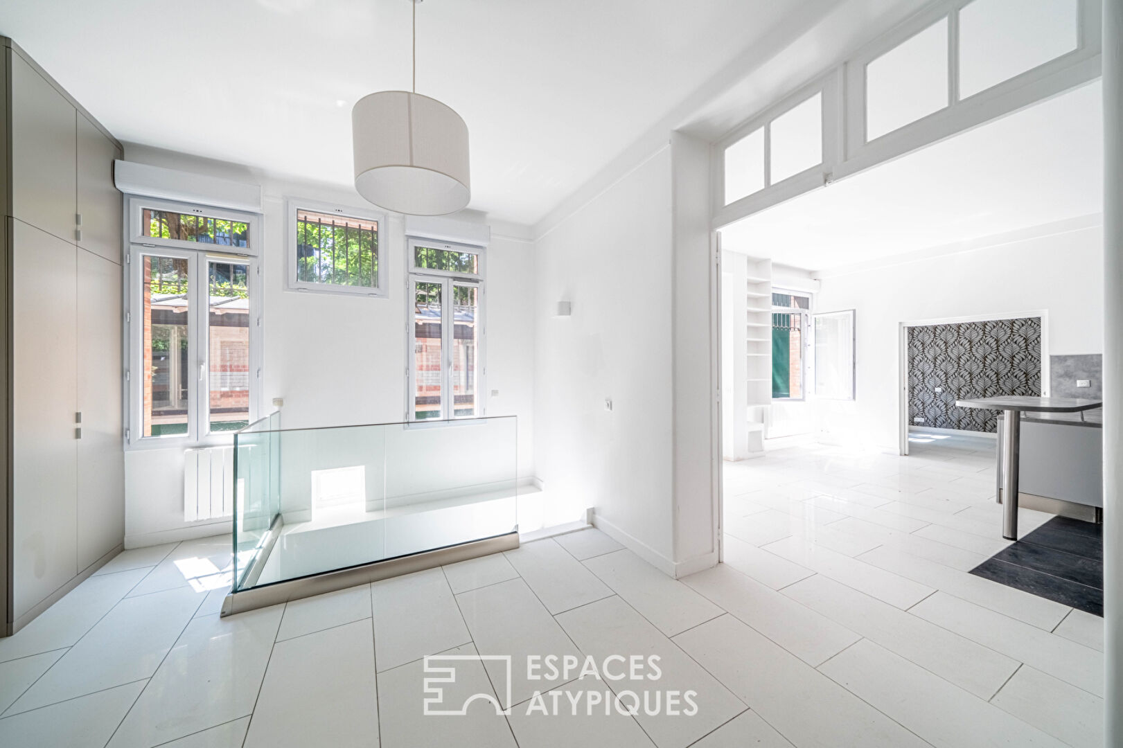 Loft avec véranda et terrasses, rue de la Colonie