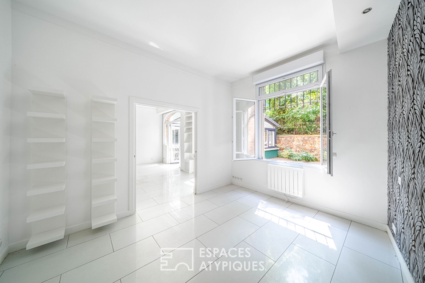 Loft avec véranda et terrasses, rue de la Colonie