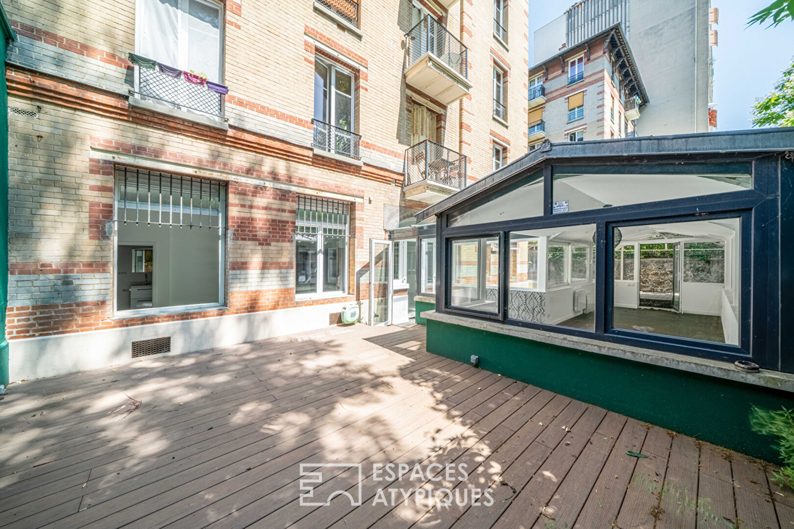 Loft avec véranda et terrasses, rue de la Colonie