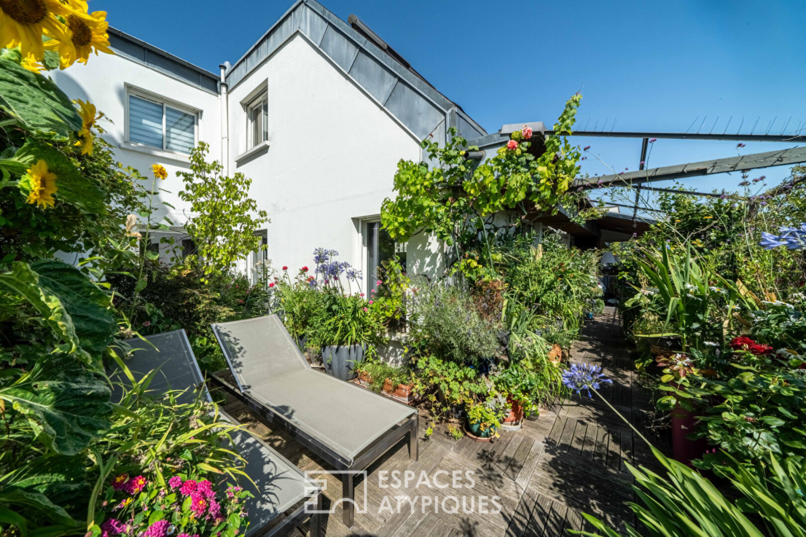 Maison sur un toit avec terrasse vue dégagée