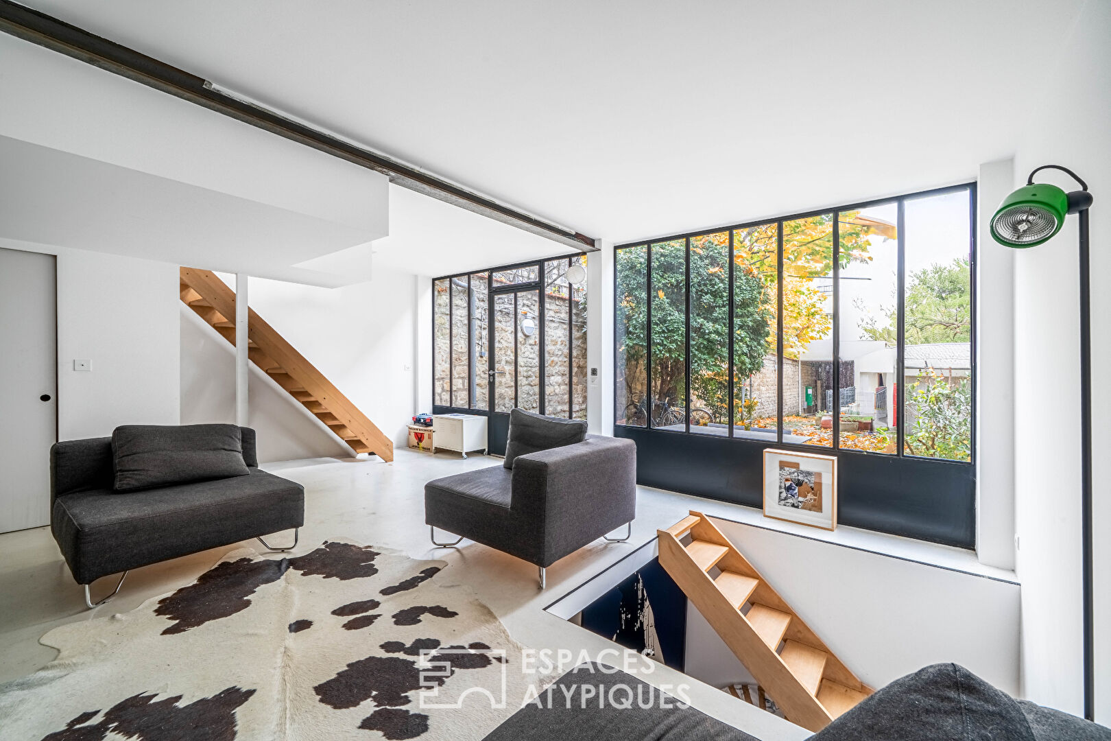 Architect-designed house at the back of the courtyard, with an artist’s studio feel