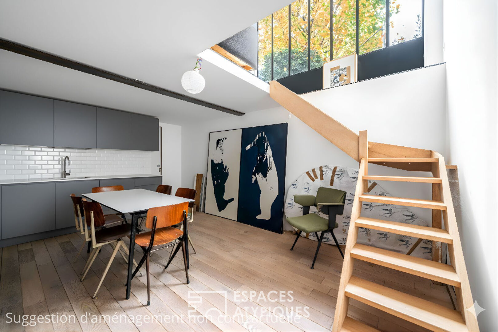 Architect-designed house at the back of the courtyard, with an artist’s studio feel