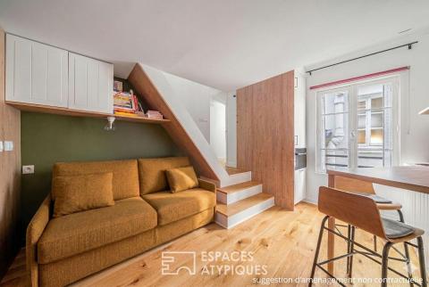 Architect’s cocoon under the rooftops near the banks of the Seine