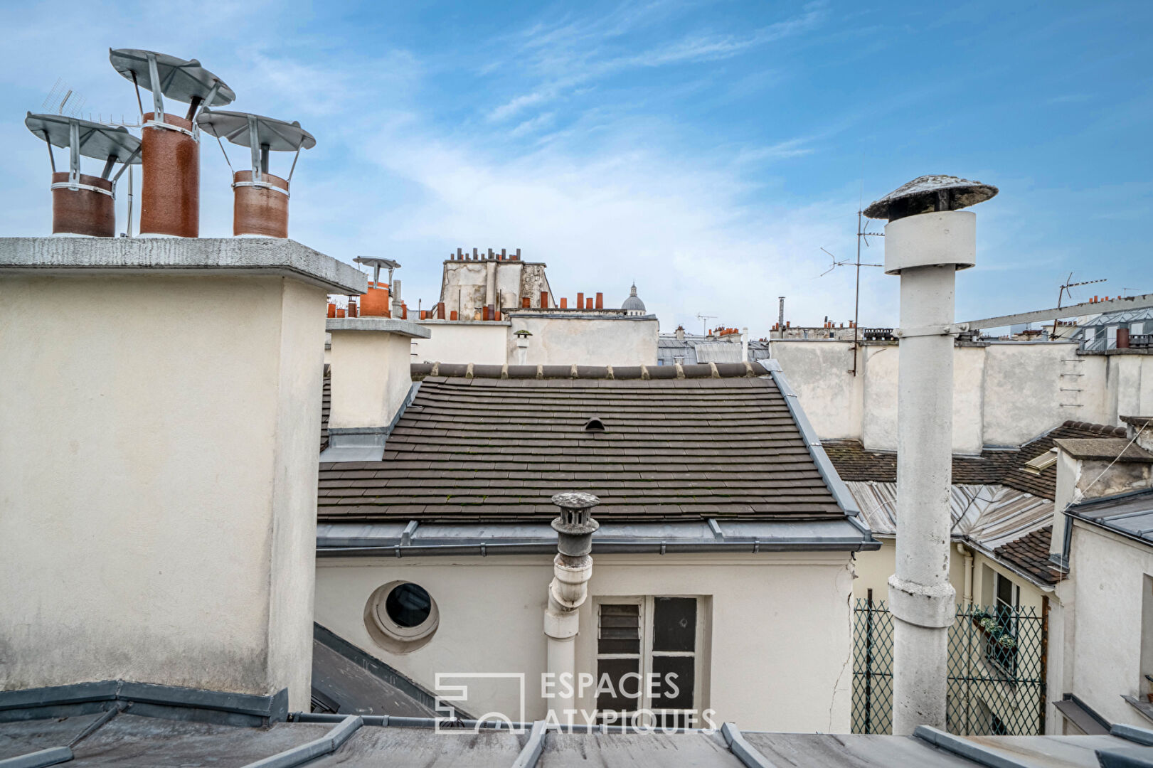 Cocon d&rsquo;architecte sous les toits près des quais de Seine