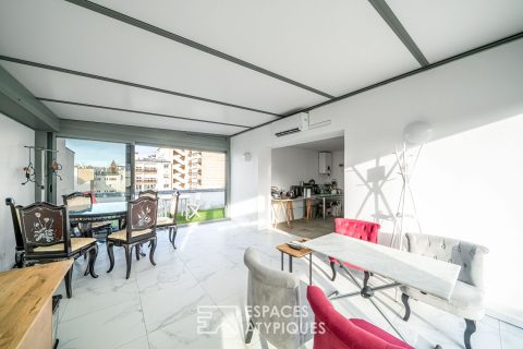 Duplex traversant au dernier étage avec terrasses dans le village Saint-Charles