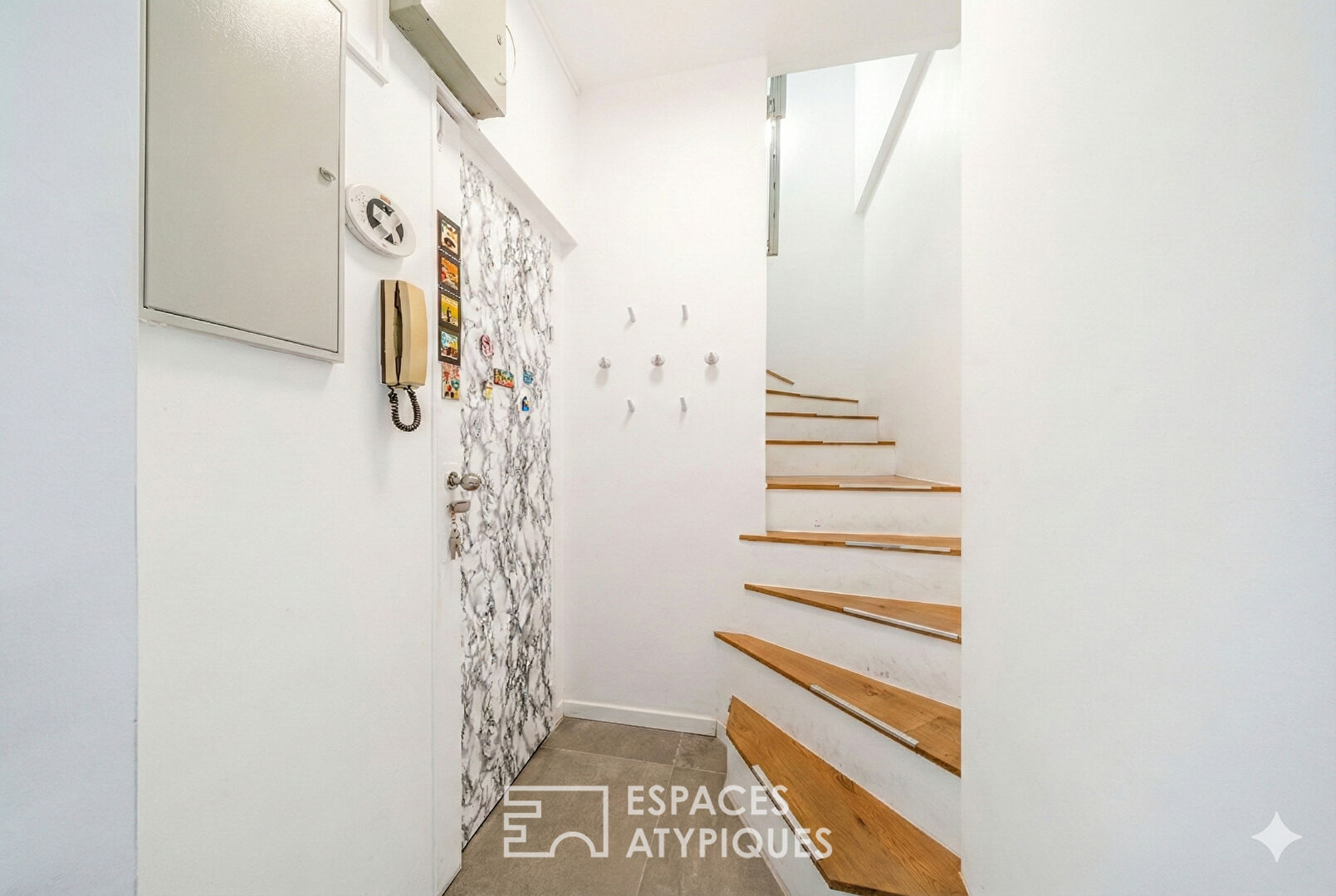 Duplex traversant au dernier étage avec terrasses dans le village Saint-Charles