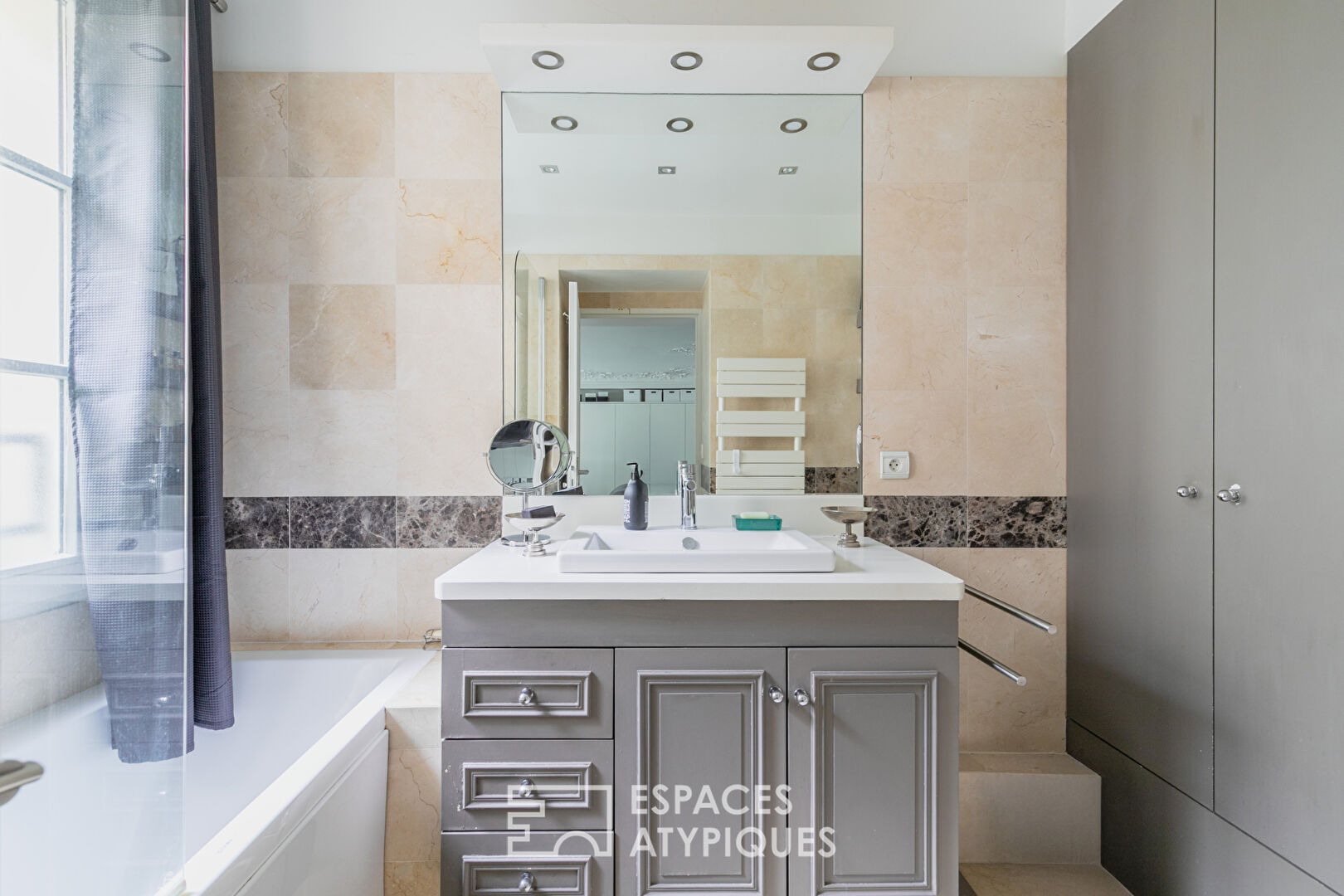 Triplex avec terrasse dans un hôtel particulier