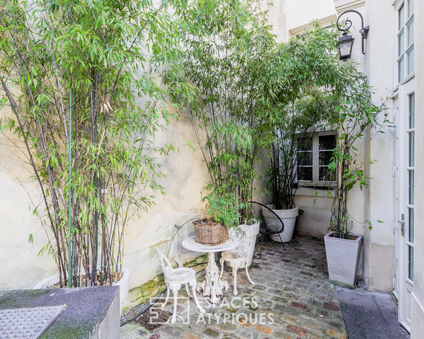 Triplex avec terrasse dans un hôtel particulier