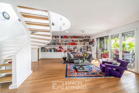 Duplex contemporain aux terrasses végétalisées, esprit canopée urbaine