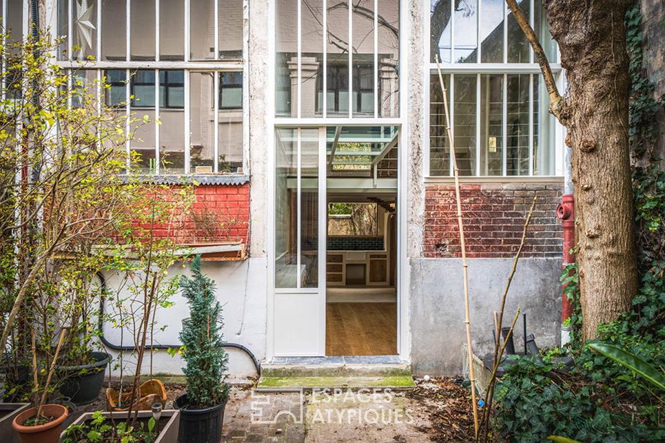 Atelier d'artiste rénové avec terrasse tolérée