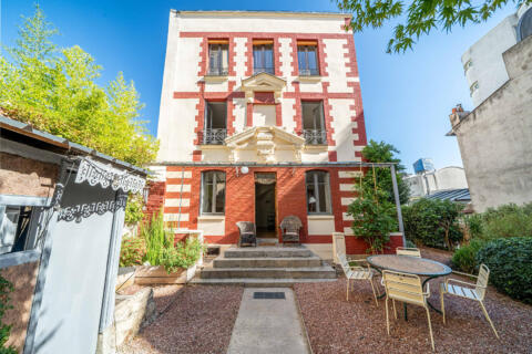 Maison avec jardin, garage et atelier
