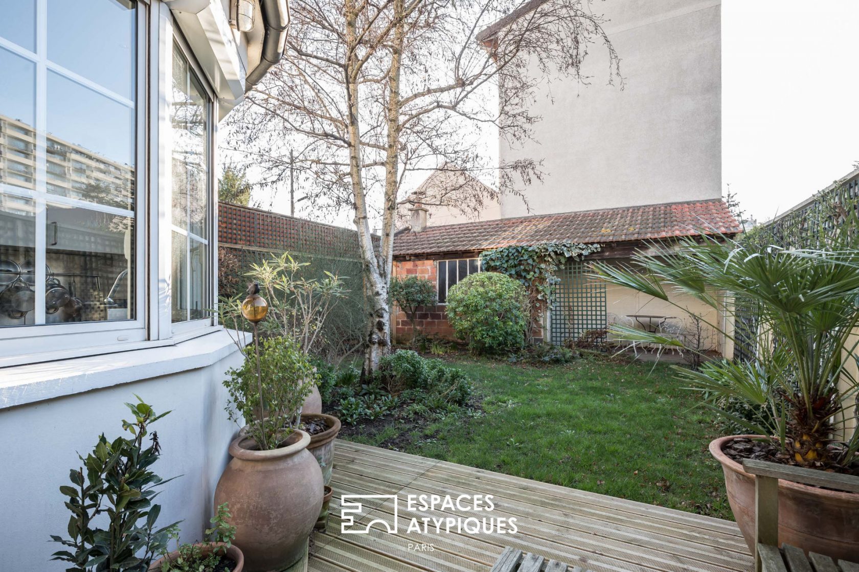 Townhouse with gardens and workshop