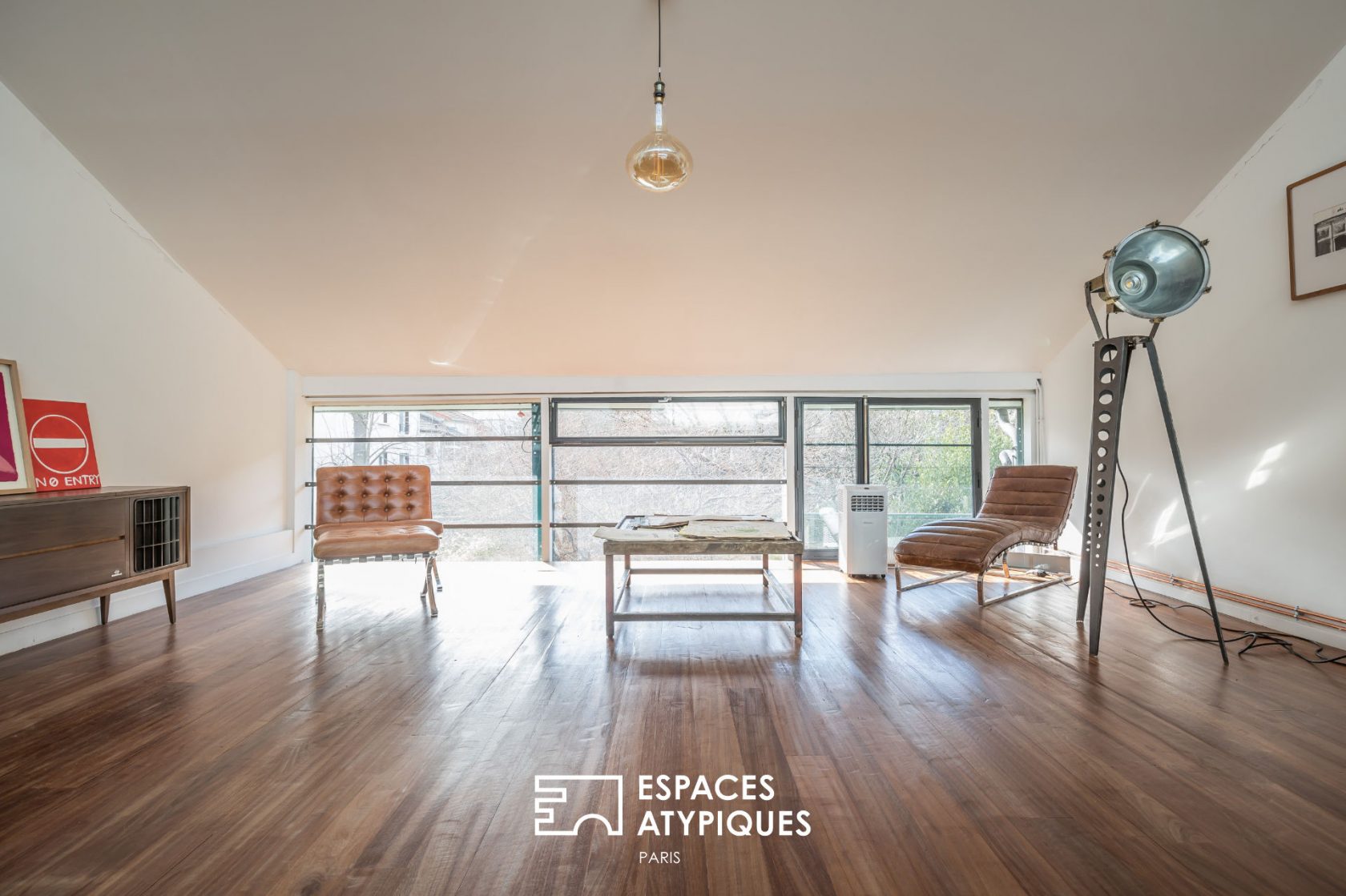 Triplex loft with terrace in an old factory