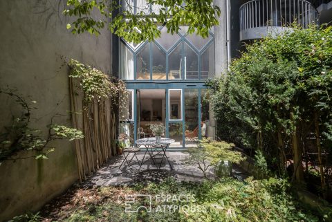 Workshop-style duplex with garden