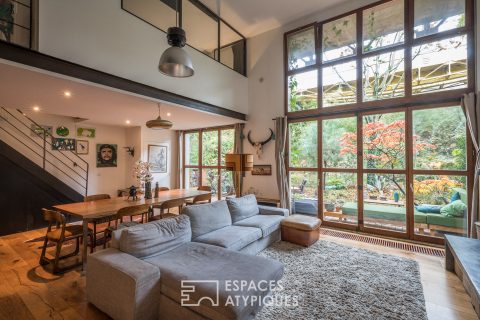Loft crossing with garden in old factory